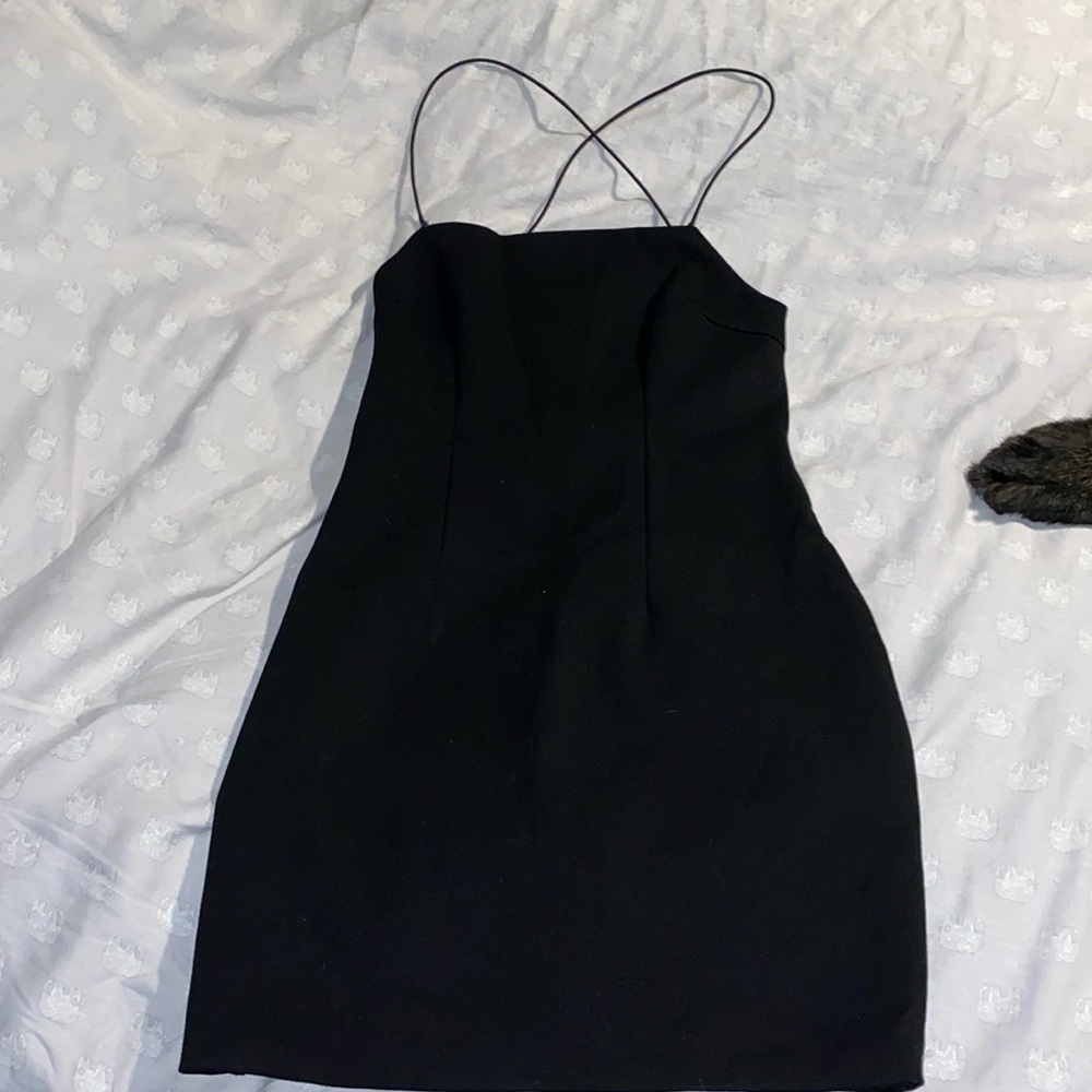 Tiger Mist short poly/soandex black dress. Size XS.